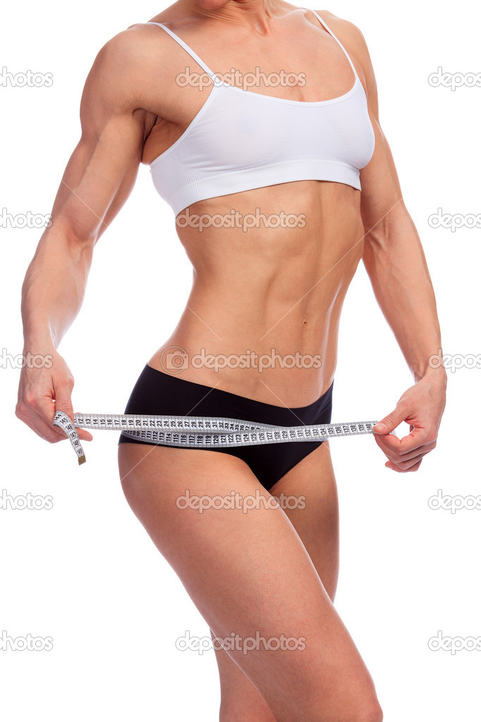 Woman measures her body, white background, copyspace