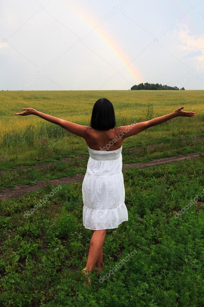 Woman and rainbow