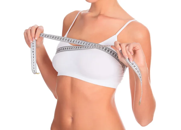 Slim woman in white underwear with tape measure, copyspace — Stock Photo, Image