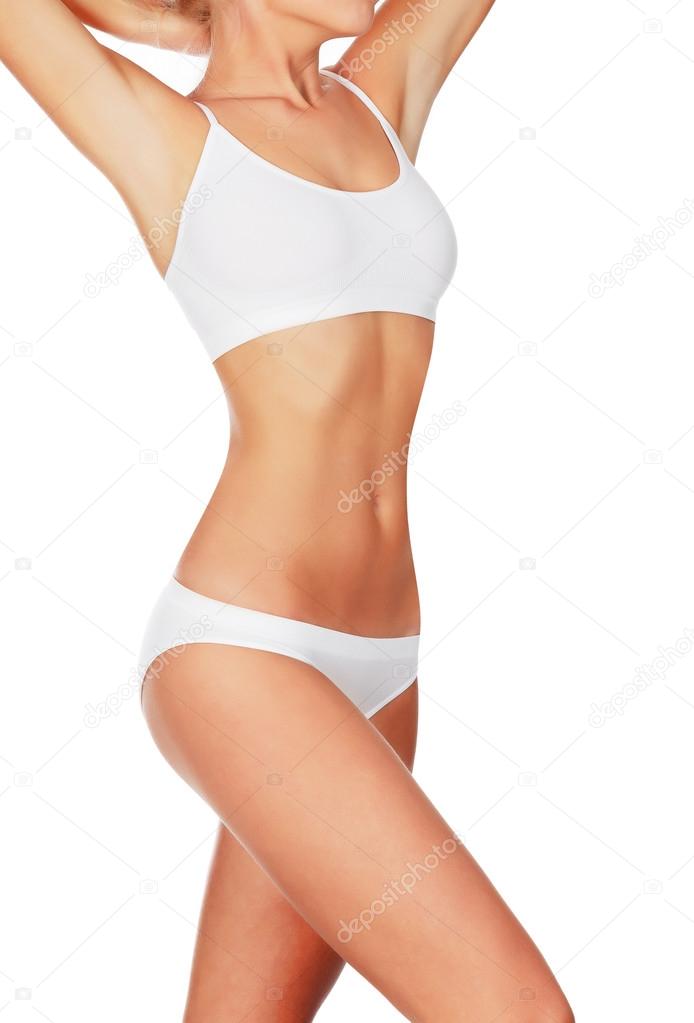 Slim woman in white underwear, copyspace