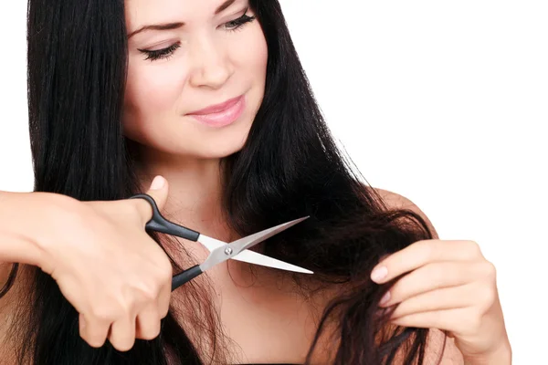 Mulher não está feliz com seu cabelo frágil, fundo branco — Fotografia de Stock