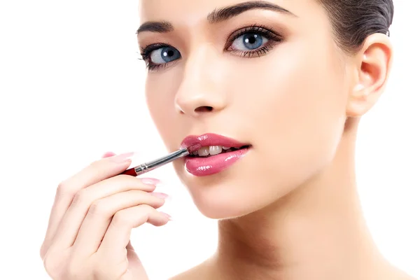 Woman applying lips — Stock Photo, Image