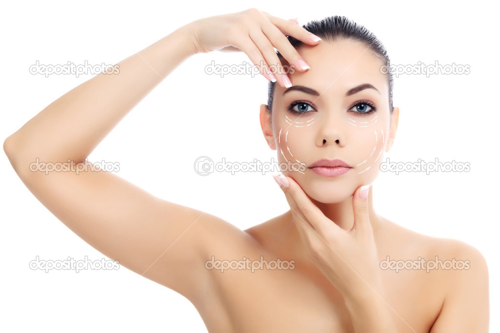 Young female with clean fresh skin, white background