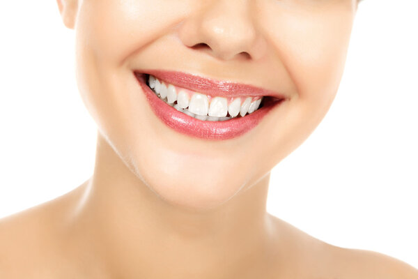 Young smiling woman, white background, copyspace