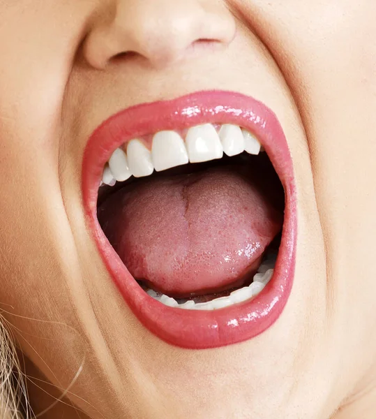 Open mouth of a woman, white healthy teet