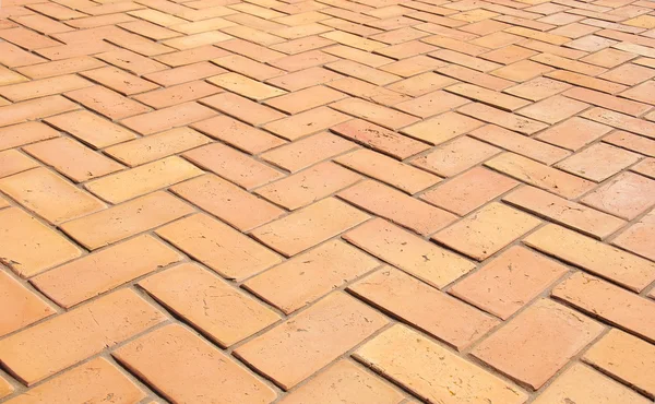 Paving slabs in the form of bricks. Background. Texture. — Stock Photo, Image