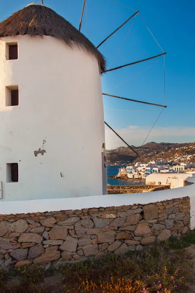 Famous windmill of Mykonos on the background of Little Venice at — Stock Photo, Image