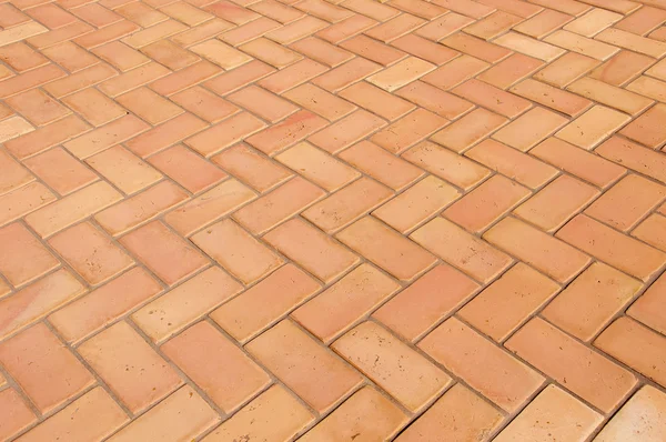 Paving slabs in the form of bricks. Background. Texture. — Stock Photo, Image