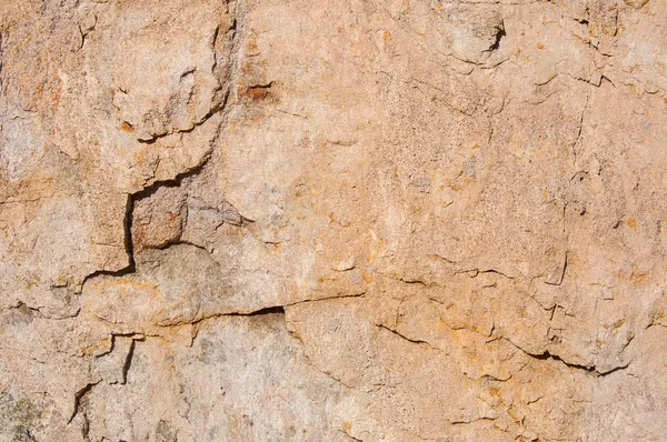 Arka plan olarak sağlam bir taş duvar — Stok fotoğraf