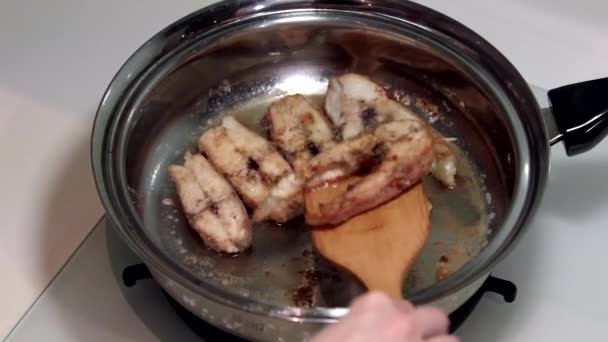 Fish fried in a pan. Part 7. — Stock Video