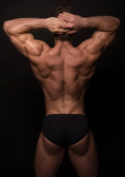 Muskulös Männlich Modell Vorführung Seine Rücken — Stockfoto