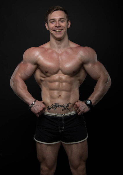 Fitness male model in studio