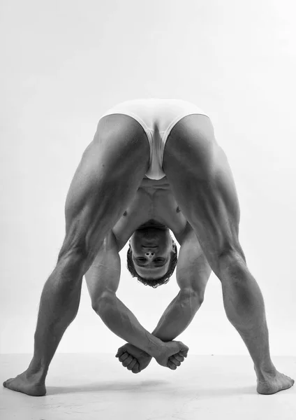 Fitness male model in studio