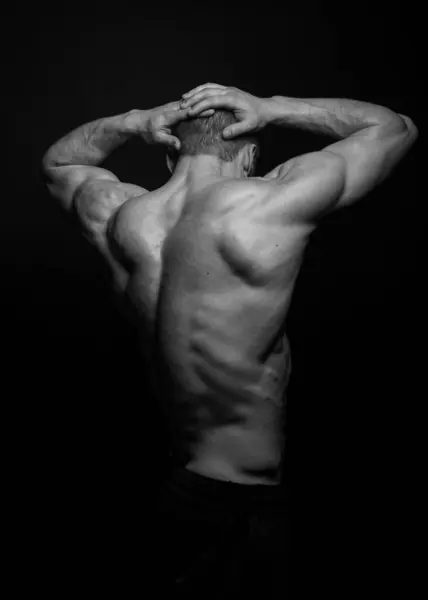 Muskulös Männlich Modell Vorführung Seine Rücken Stockbild