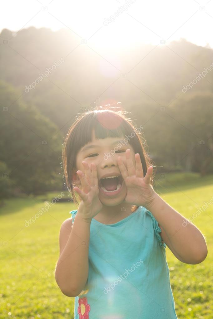 Child shouting in park