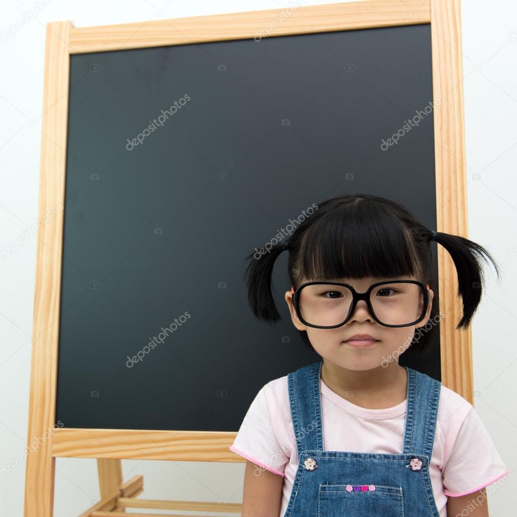 Little kid with blackboard