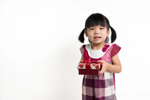 Little Asian child with gift box — Stock Photo, Image