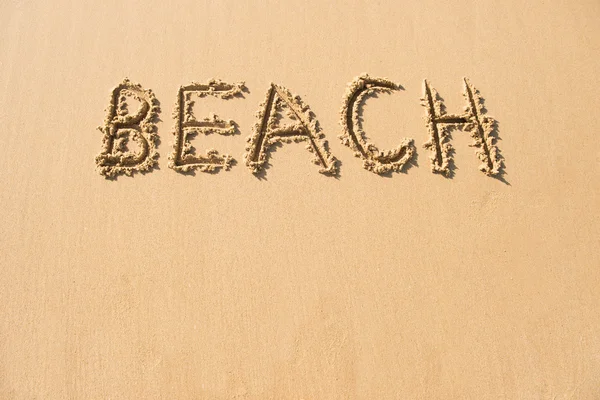 Palabra playa escrita en la playa — Foto de Stock