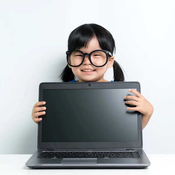 Baby girl with laptop — Stock Photo, Image