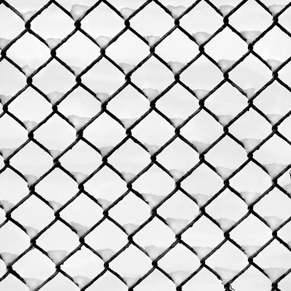 Winter snow-on-fence pattern. — Stock Photo, Image