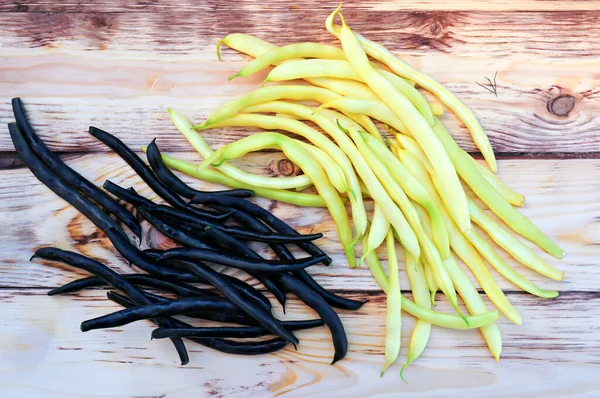 Pods Black Yellow Green Beans Wooden Table Top View — Stock Photo, Image