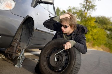 Changing tires clipart