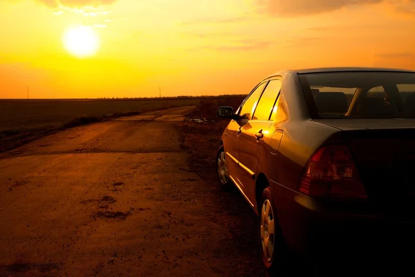 Sonnenuntergang im Auto — Stockfoto