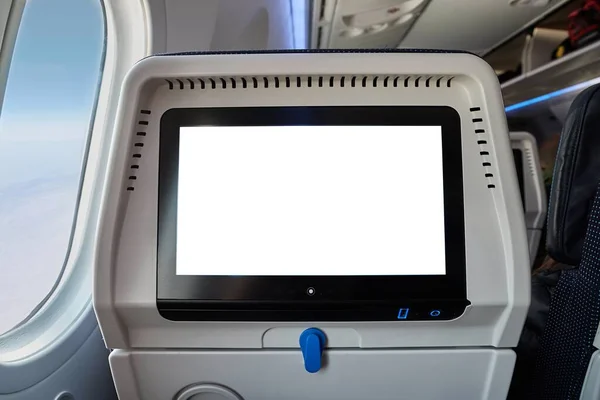 Информационно-развлекательный экран самолета — стоковое фото