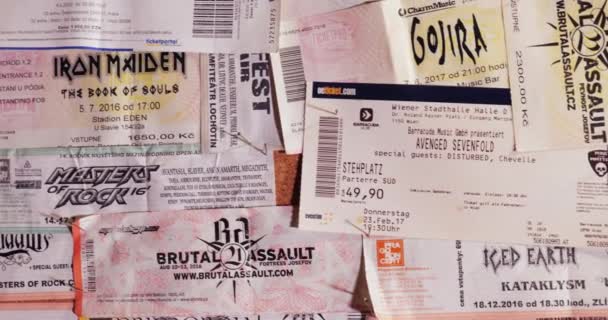 Concert tickets on a wall, rock and metal music — Stock Video