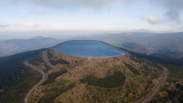 Pumped water storage hydroelectric plant reservoir aerial drone view — Stockvideo