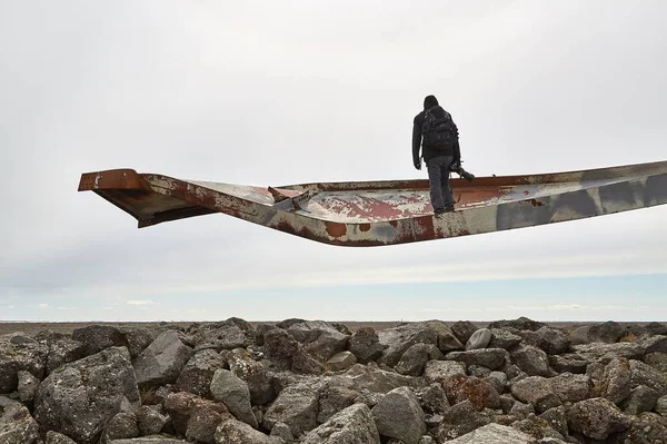 Photographer on broken bridge metal beam — Stock Photo, Image