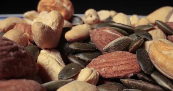 Nueces y semillas macro, macro de movimiento de lente de sonda — Vídeo de stock
