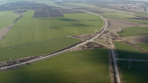 Countryside agricultural fields and road aerial view — Wideo stockowe