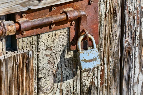 Locked gate for a wooden shed — Photo