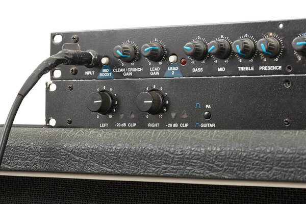Guitar amplifier, preamp and power amp detail, gain and tone control knobs
