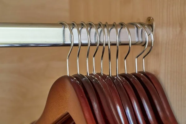 Empty hangers in a wardrobe — 图库照片