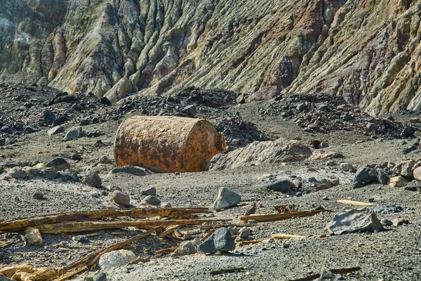 Old rusty boiler scrap metal on rocky terrain — Foto de Stock