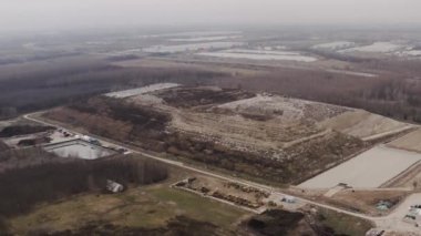 Landfill garbage dump for municipal waste drone aerial view over huge piles of trash