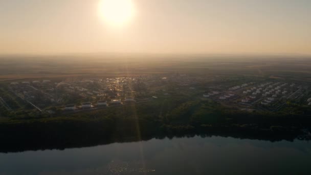 Oil Refinery Fuel Storage Silos River Aerial View Drone Footage — Stock video