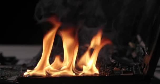 Laptop Burning Flames Desk Fire Hazard Losing Valuable Data Closeup — Stock Video