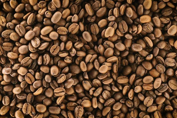 Coffee beans pile background texture