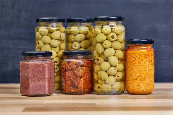 Jars Olives Pesto Dried Tomatoes Caper Shelf — Stock Photo, Image