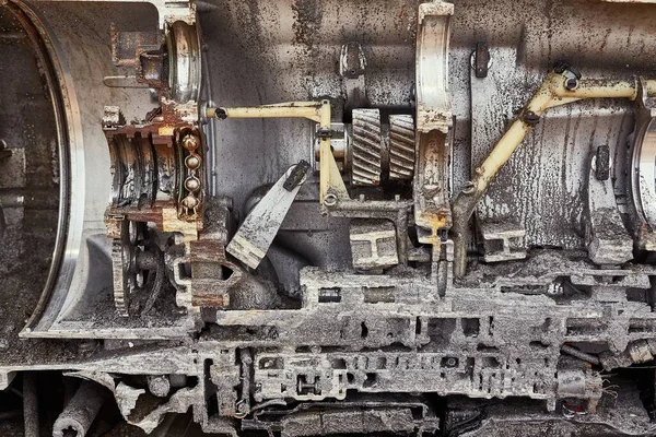 Car engine and gearbox cross section cut in half to display engineering details