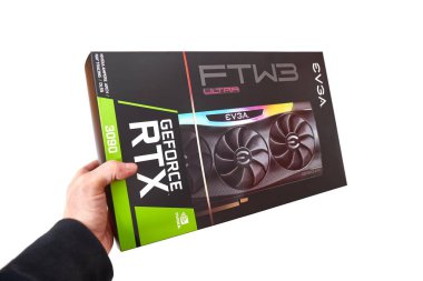 Budapeşte, Macaristan - 2020 dolaylarında: Nvidia Geforce RTX 3090 Graphics Card, EVGA tarafından kutusunda yapıldı. Nvidia RTX 30 serisinin üst düzey GPU 'su, beyaz arkaplan, elde tutulan