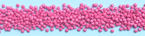 Ευρύ Περίγραμμα Από Ροζ Επικαλυμμένα Καραμέλες Σοκολάτας Μπλε Παστέλ Φόντο — Φωτογραφία Αρχείου