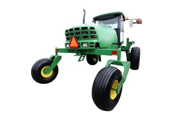 Зеленый трактор — стоковое фото