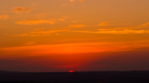 Big sun at sunset — Stock Photo, Image