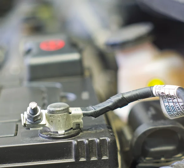 Cables connect to a car battery — Stock Photo, Image
