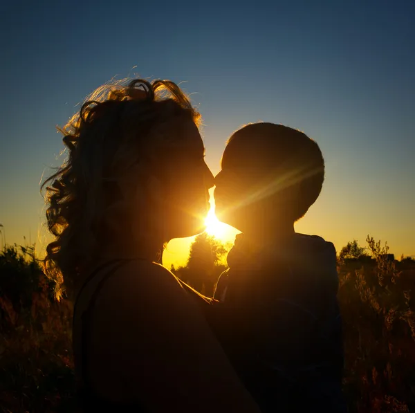 A gentle kiss between mother and son — Stock Photo, Image