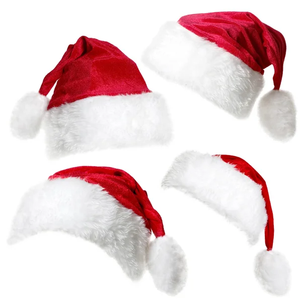 Gorras de Santa Claus aisladas sobre un fondo blanco — Foto de Stock